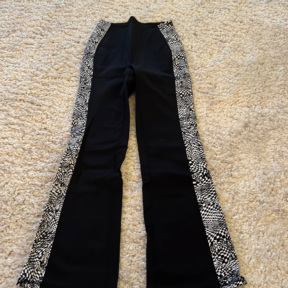 high waisted flare free people movement leggings XS in black checkered pattern